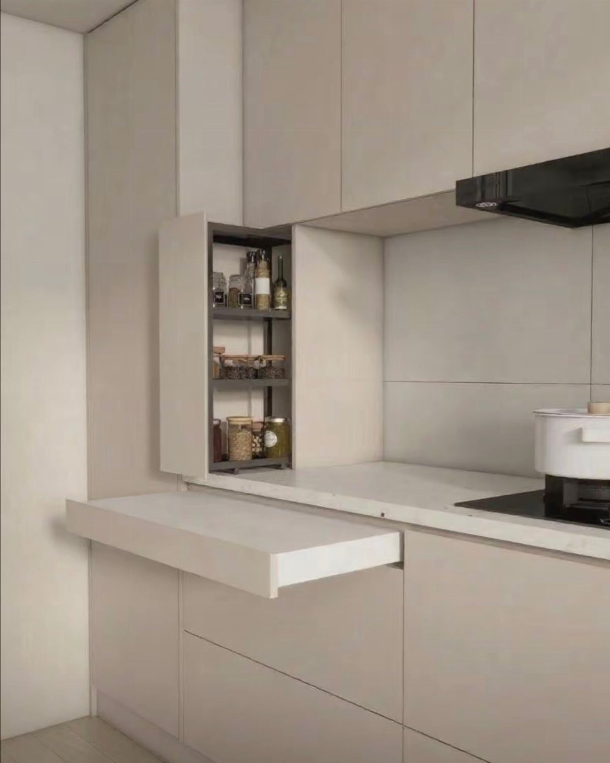 White pull out counter extension in a modern minimalist kitchen with open pantry.